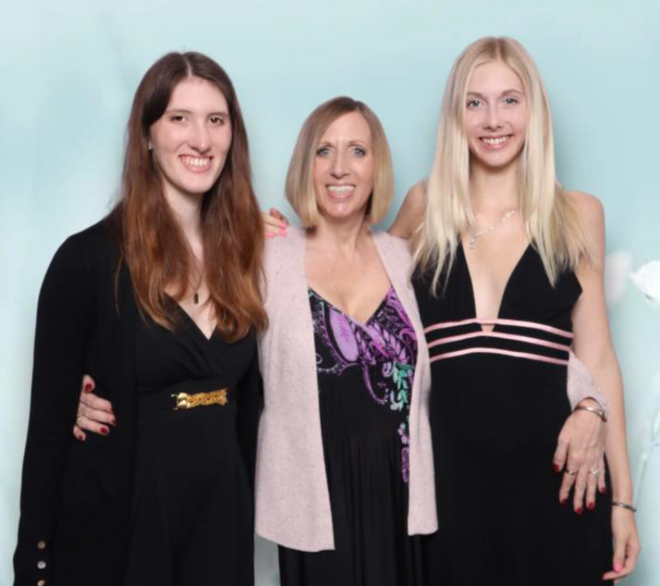 photo of christy burke with her daughters